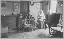 SA0056 - Julia Scott and four young girls are shown in the wash house. Identified on the reverse.